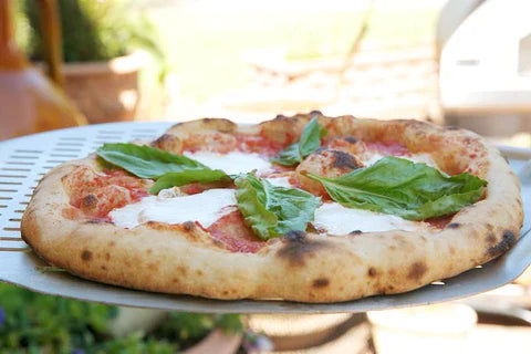March Madness: Why the Pizza Oven Reigns Supreme Over the Grill in 2024